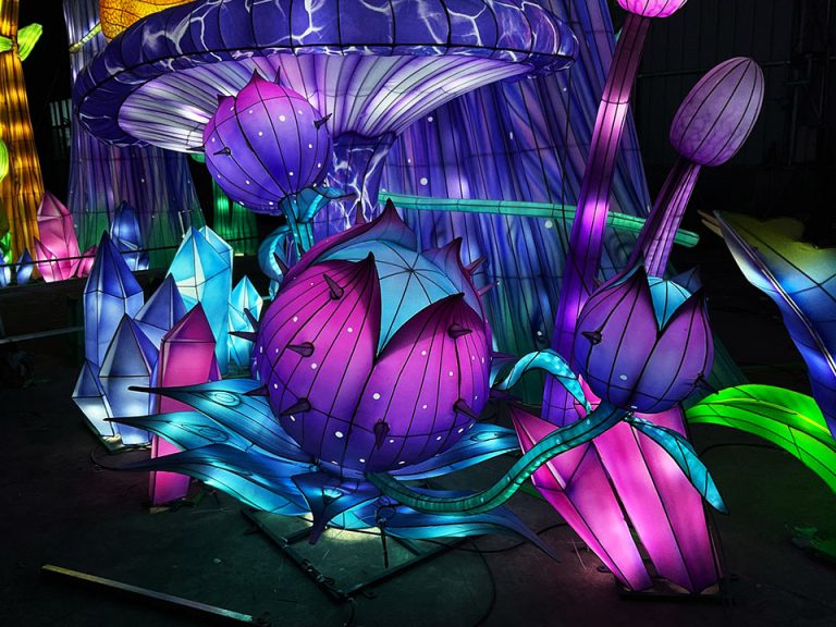 Fantastically colored purple carnivorous plants and mushroom lanterns