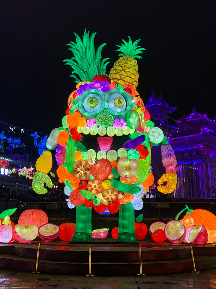 Colorful Mid-Autumn Festival lanterns composed of fruits and vegetables.