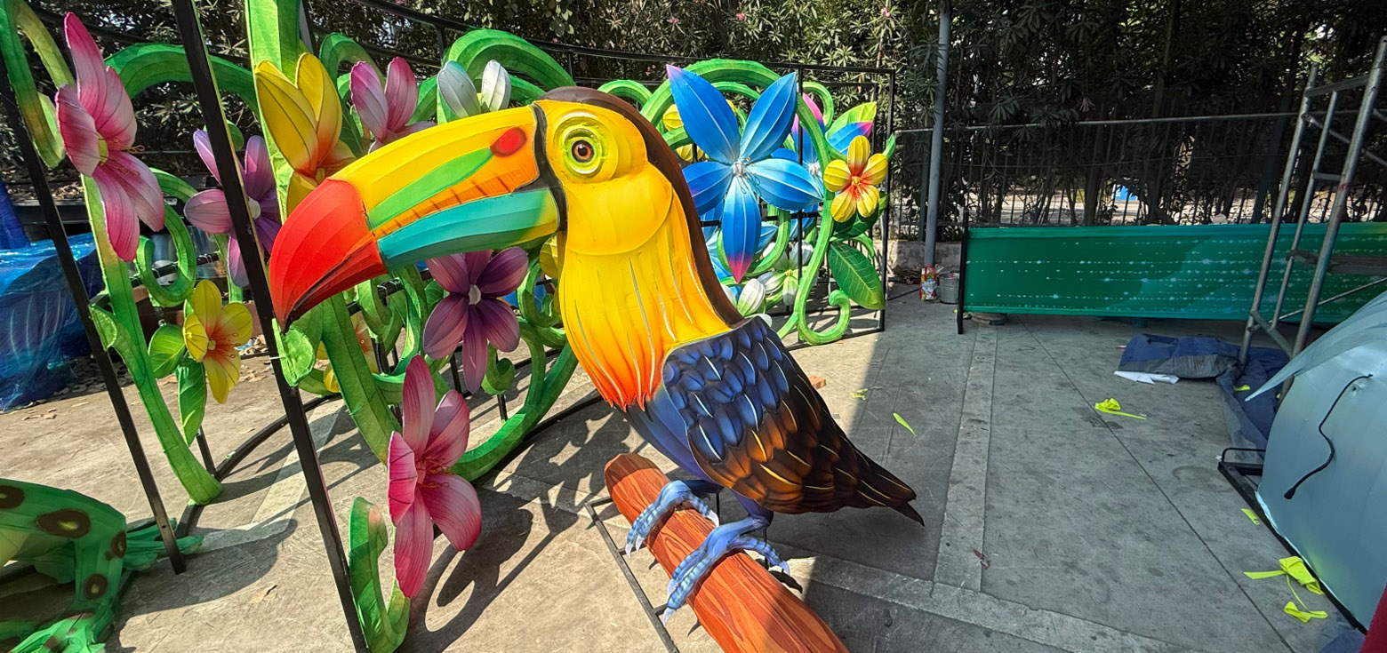 Zoo & Botanical garden Lantern Festival Solutions 7 Handcrafted toucan and flower lanterns designed for an outdoor zoo lantern festival.