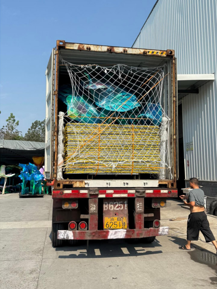 Lantern Freight Optimization 7 Loading wrapped modules into a shipping truck to maximize lantern container utilization.