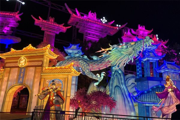 A custom-made festival lantern display: a Chinese dragon and pavilion buildings.