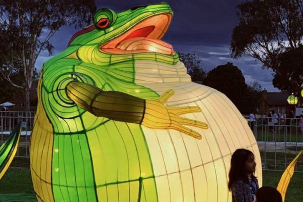 A cute, frog-shaped Chinese lantern light installation, a favorite photo spot for children.
