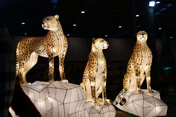 Three animal lanterns shaped like leopards, highly restored to realism.
